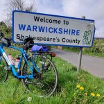 "Welcome to Warwickshire" with a bicycle