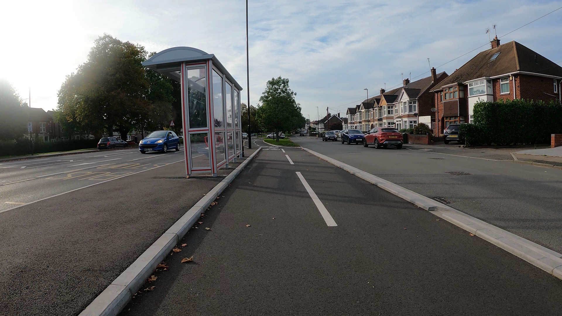 Separated bidirectional cycleway in Coventry. A floating bus-stop is on the left of the image.